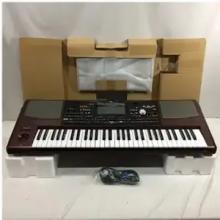 New Korg Pa1000 61-Key Keyboard.jpg